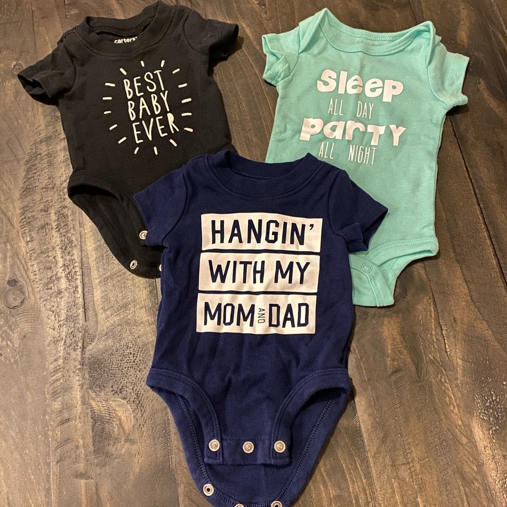 3 assorted onesies NB